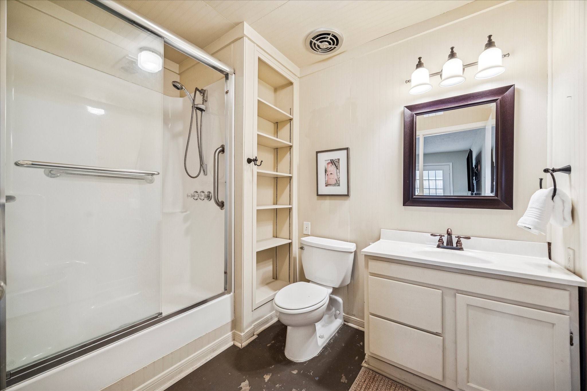 7906 Meadowbriar Lane Houston, TX 77063 - Photo 30 of 34 The guest house bathroom features a full shower.