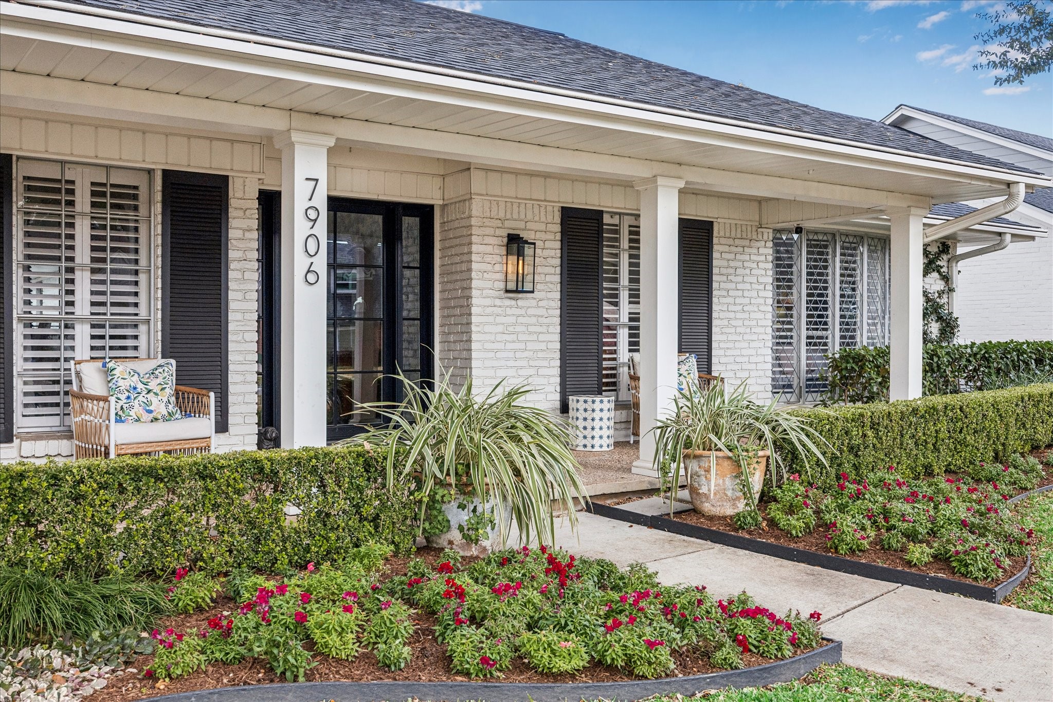 7906 Meadowbriar Lane Houston, TX 77063 - Photo 6 of 34 Wonderful covered porch with ample room for seating, a great place for your morning coffee and catching up with neighbors. This home is ideally located on one of the best streets in the family-friendly Briarmeadow neighborhood.