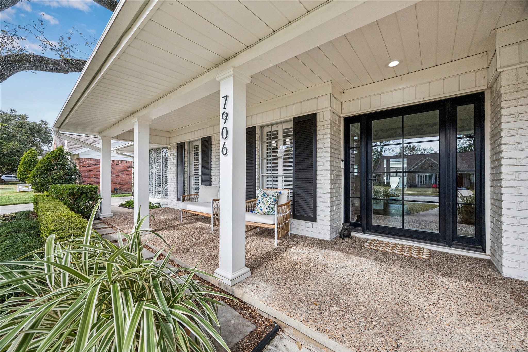 7906 Meadowbriar Lane Houston, TX 77063 - Photo 7 of 34 This new front door gives this traditional home a modern touch.