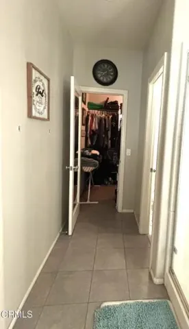 a view of a livingroom with furniture and front door