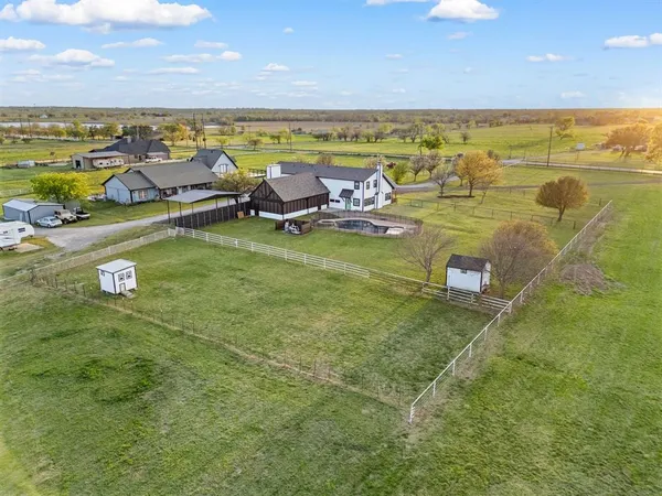 a view of a golf course with a lake