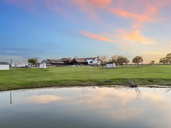 a view of a garage with wooden walls