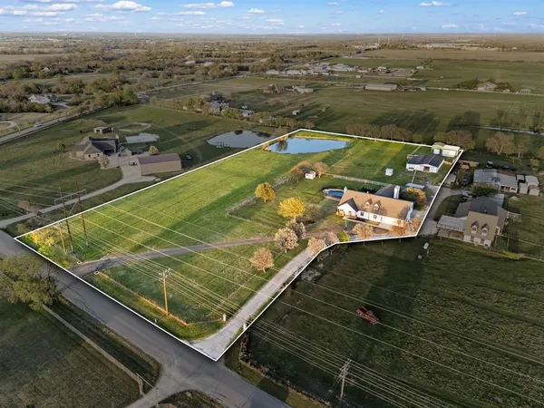 a view of a pool with a ocean view