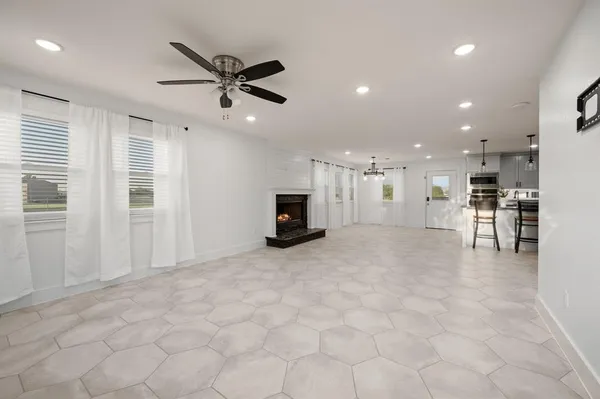view of a livingroom with furniture and kitchen view