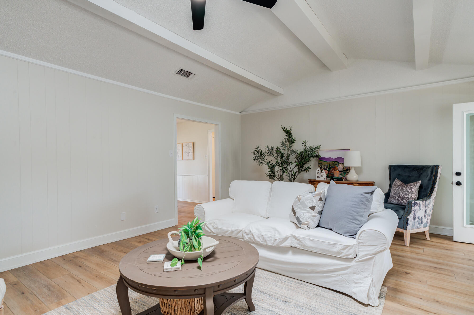 3405 91st Street Lubbock, TX 79423 - Photo 13 of 41 a living room with furniture and a table