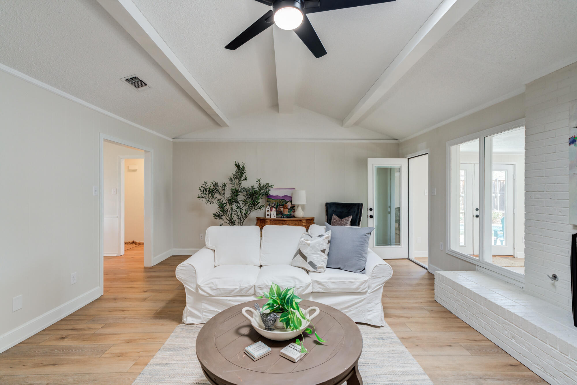 3405 91st Street Lubbock, TX 79423 - Photo 15 of 41 a living room with furniture and a large window