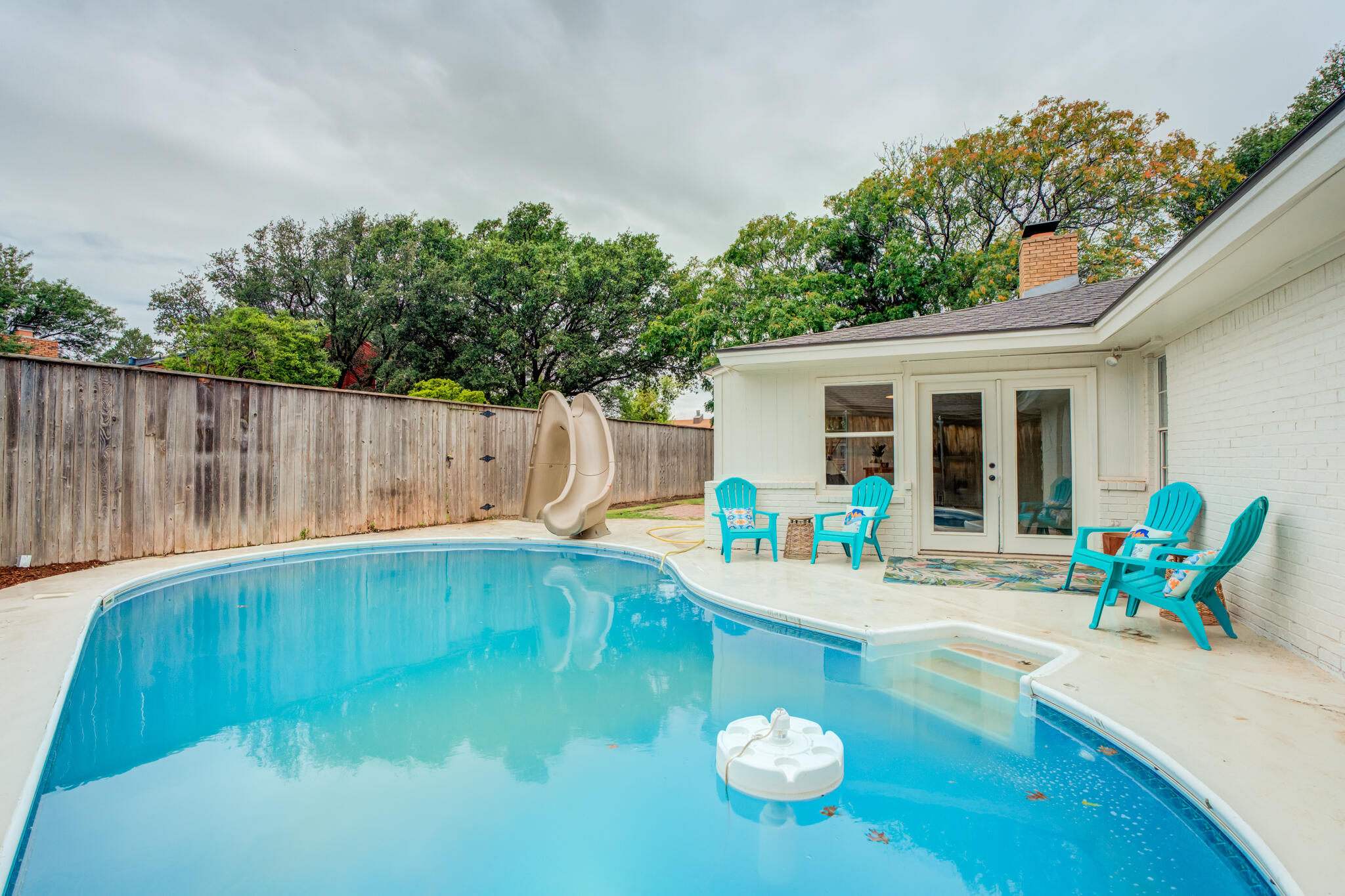 3405 91st Street Lubbock, TX 79423 - Photo 39 of 41 swimming pool view with a seating space