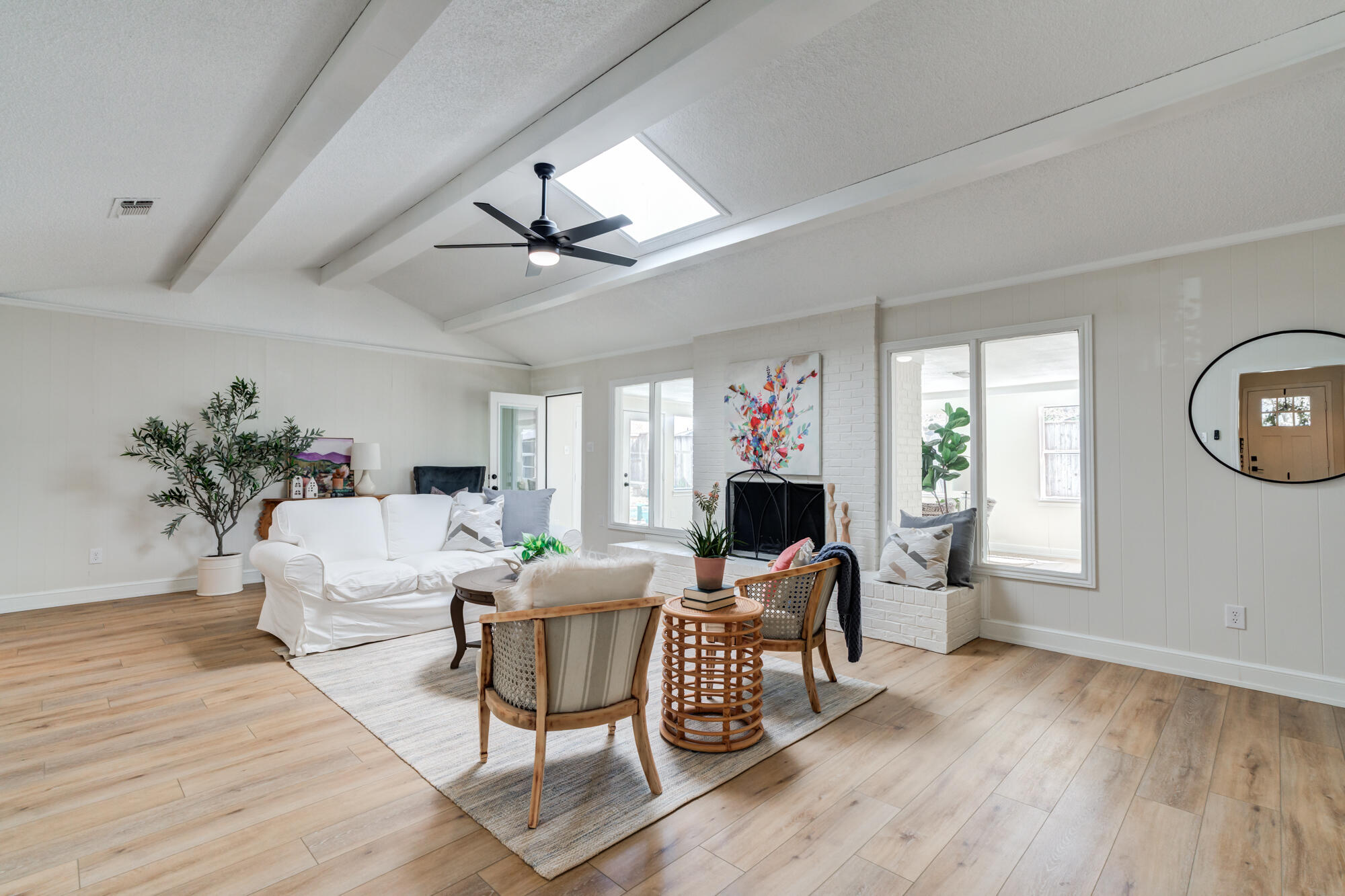 3405 91st Street Lubbock, TX 79423 - Photo 6 of 41 a living room with furniture and a large window