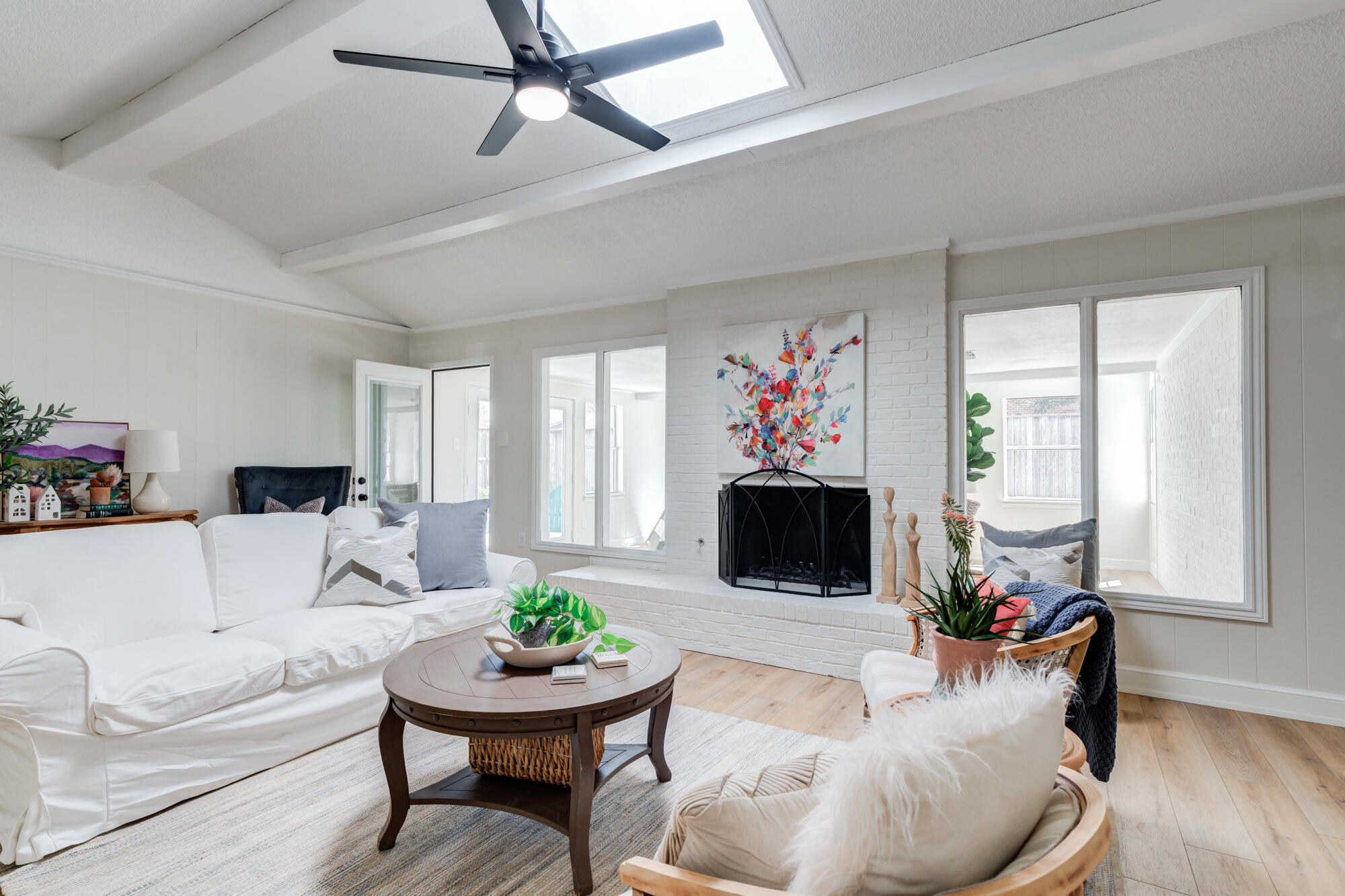 3405 91st Street Lubbock, TX 79423 - Photo 7 of 41 a living room with furniture and a flat screen tv