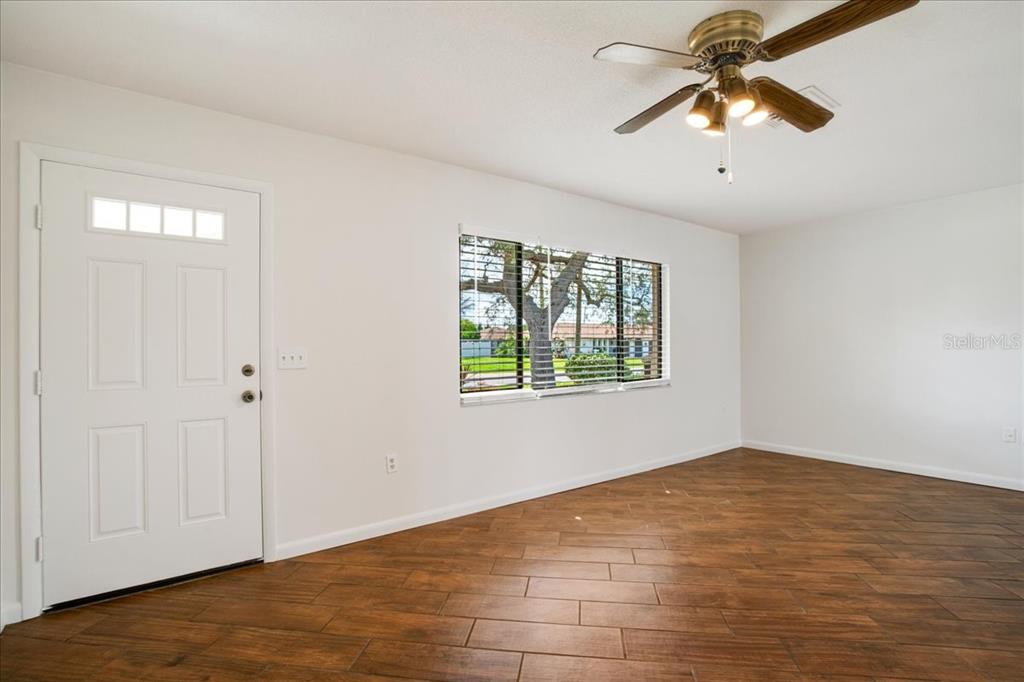 1312 Jamaica Road Venice, FL 34293 - Photo 14 of 35 Living room and front entry door