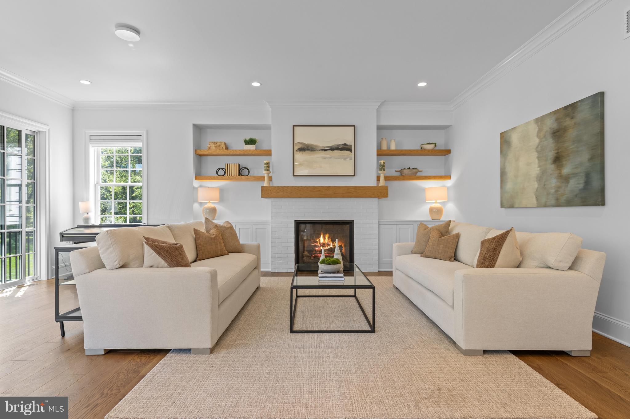 1052 Prescott Road Berwyn, PA 19312 - Photo 18 of 65 a living room with furniture and a fireplace