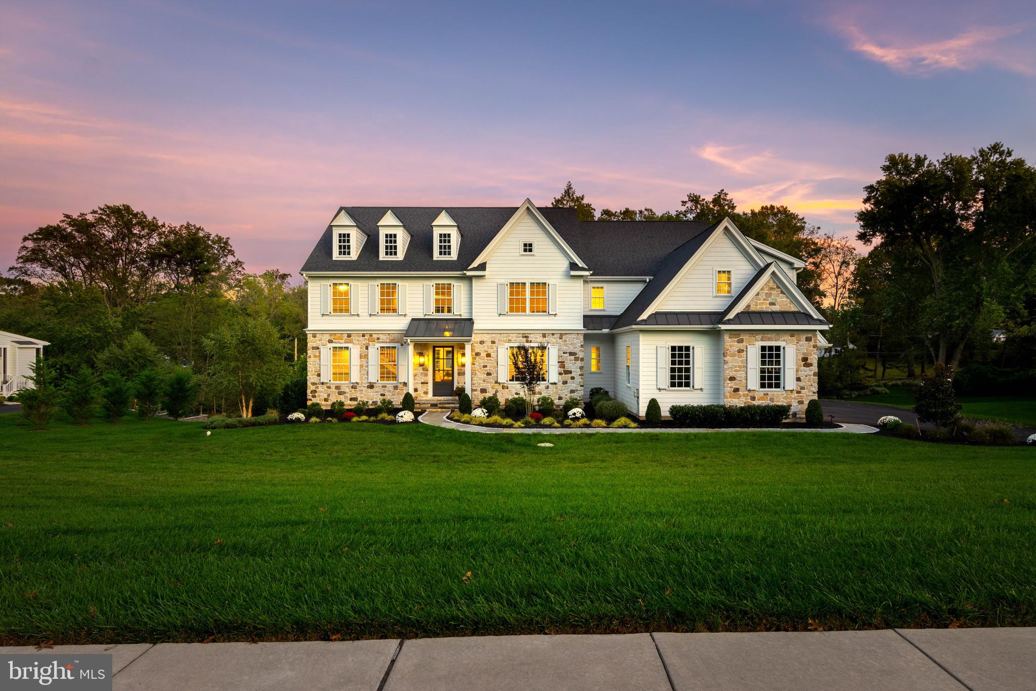 1052 Prescott Road Berwyn, PA 19312 - Photo 2 of 65 a front view of a house with a garden