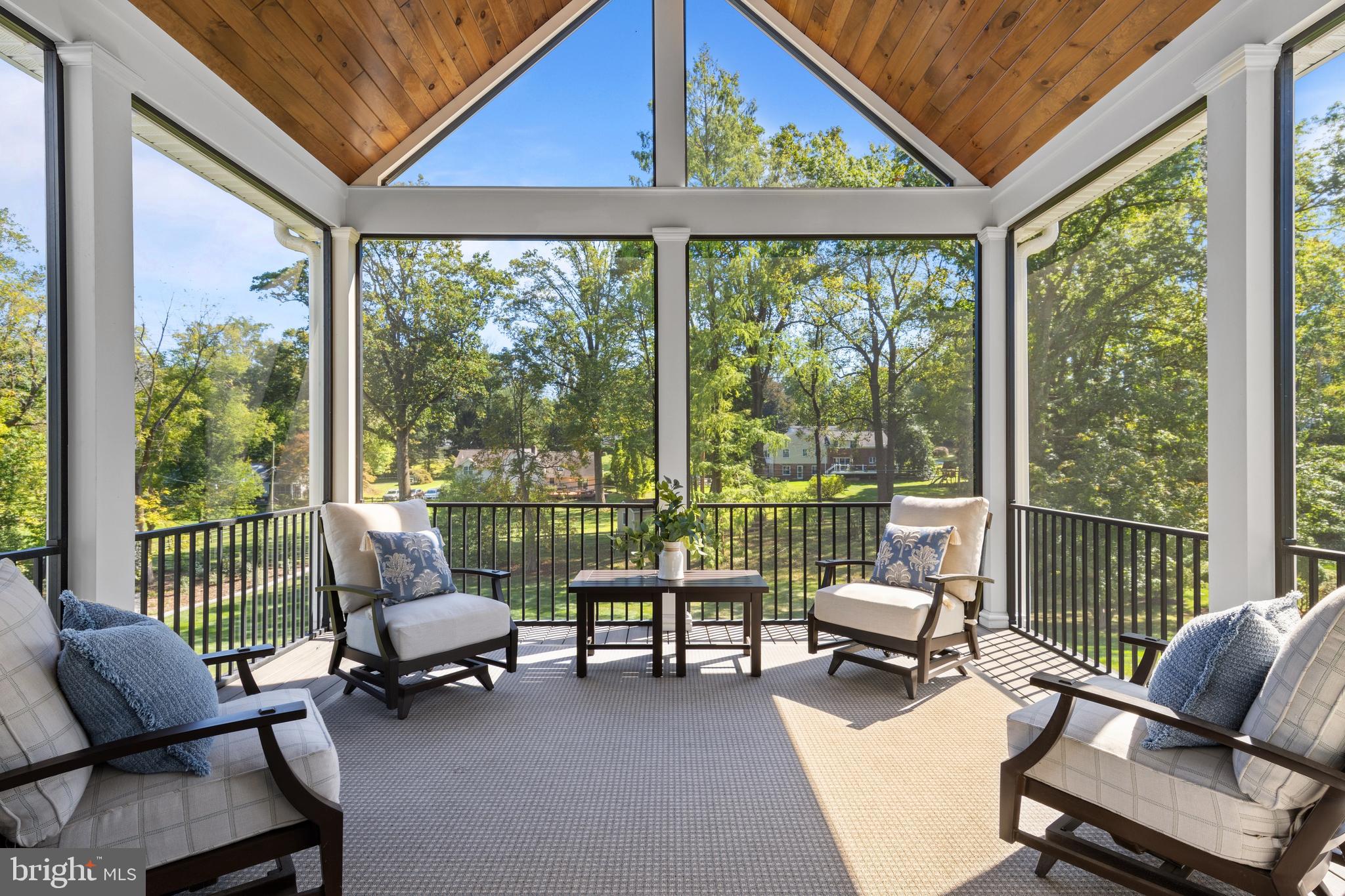 1052 Prescott Road Berwyn, PA 19312 - Photo 22 of 65 a living room with furniture and floor to ceiling windows
