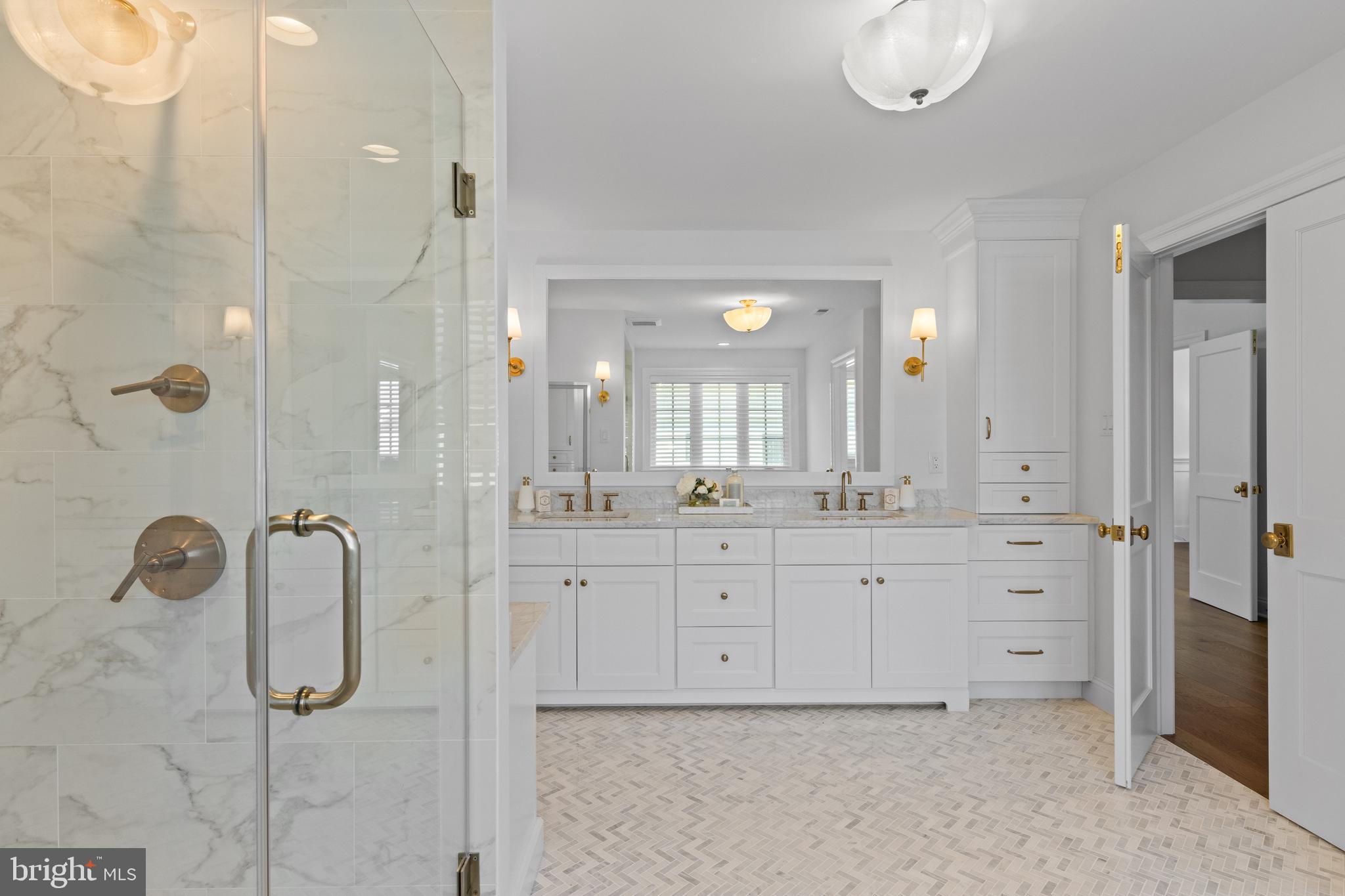 1052 Prescott Road Berwyn, PA 19312 - Photo 44 of 65 a bathroom with a shower tub and mirror