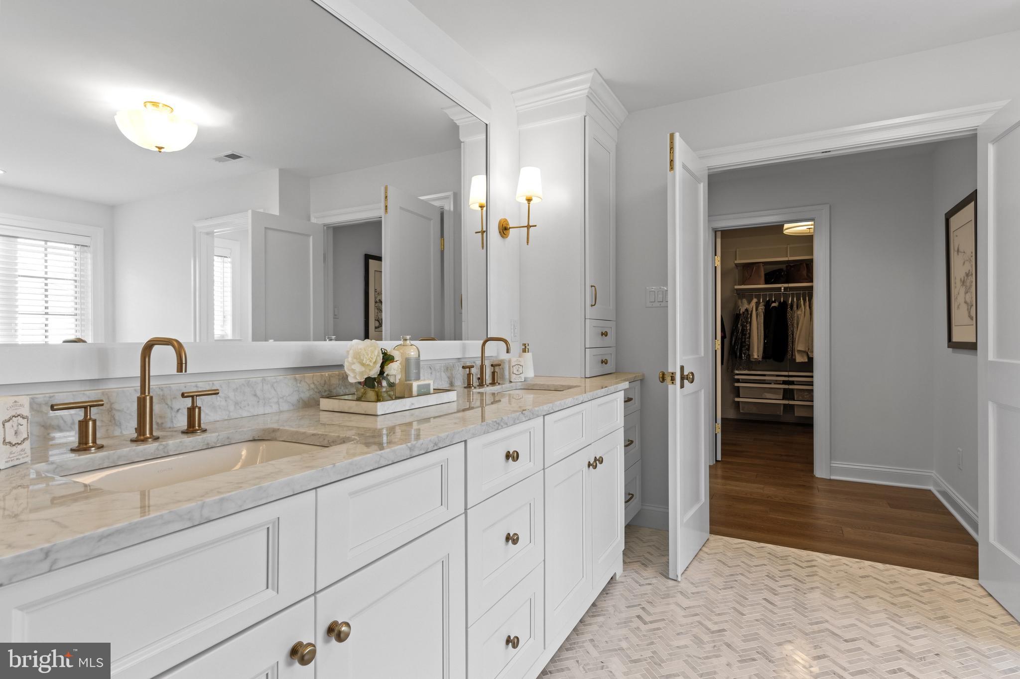 1052 Prescott Road Berwyn, PA 19312 - Photo 46 of 65 a bathroom with double sink and a mirror