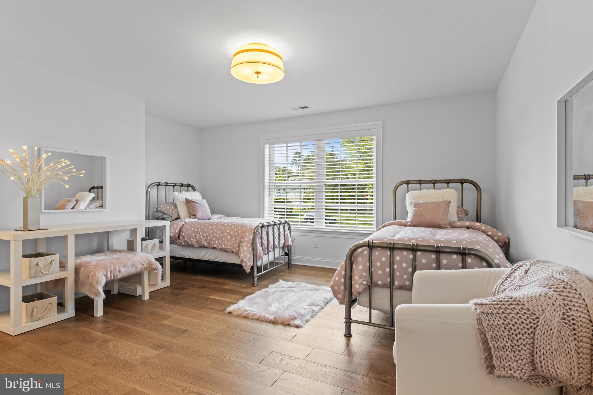 1052 Prescott Road Berwyn, PA 19312 - Photo 47 of 65 a bedroom with a bed and a window