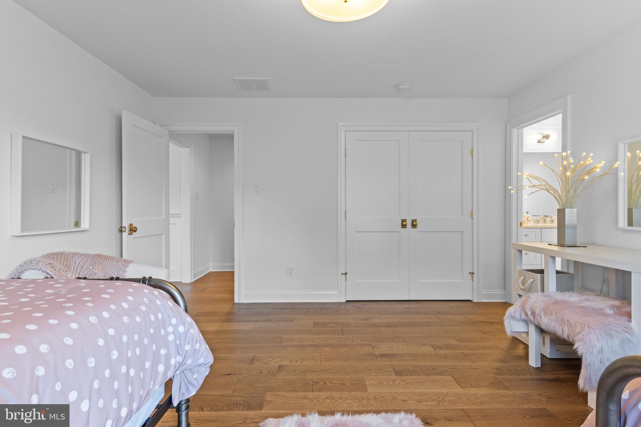 1052 Prescott Road Berwyn, PA 19312 - Photo 48 of 65 a bedroom with a bed and a table