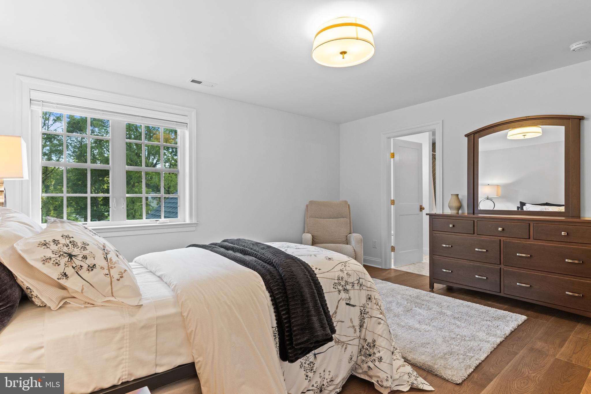 1052 Prescott Road Berwyn, PA 19312 - Photo 50 of 65 a bedroom with a bed and a window