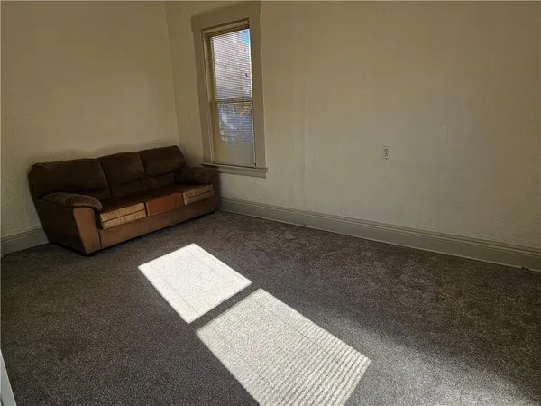 a living room with a couch and a coffee table