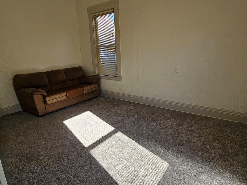 629 R Walnut Street Irwin, PA 15642 - Photo 21 of 25 a living room with a couch and a coffee table