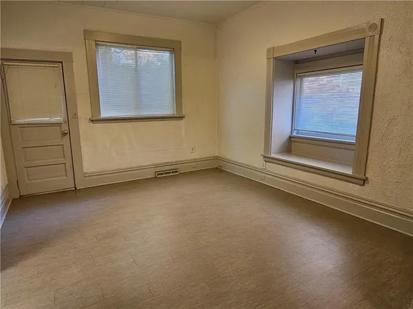 an empty room with a window