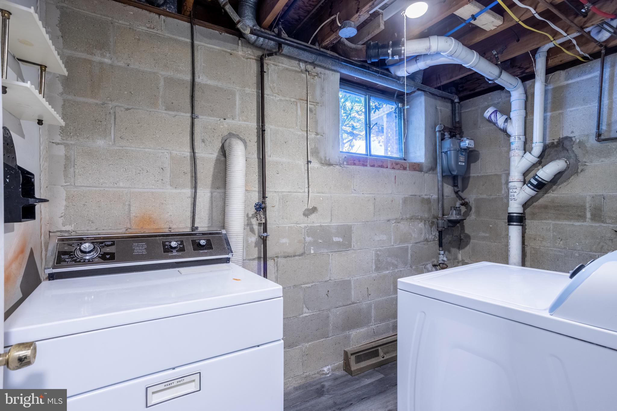 3207 Midfield Road Pikesville, MD 21208 - Photo 39 of 45 a utility room with dryer and washer