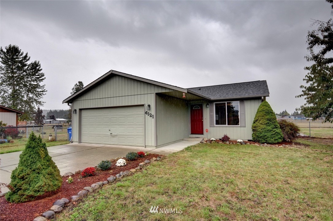 4121 Violet Court Southwest Rochester, WA 98579 - Photo 21 of 21 a front view of house with yard