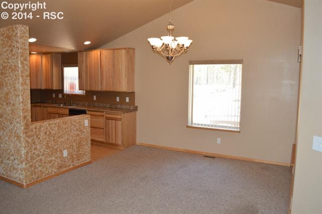 31 Spruce Creek Road Divide, CO 80814 - Photo 3 of 12 Open dining area adjoins kitchen.