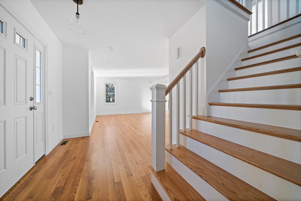 1 Northway Road Randolph, MA 02368 - Photo 16 of 40 a view of entryway with wooden floor