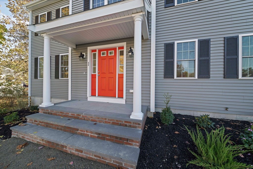 1 Northway Road Randolph, MA 02368 - Photo 3 of 40 a front view of a house with a yard