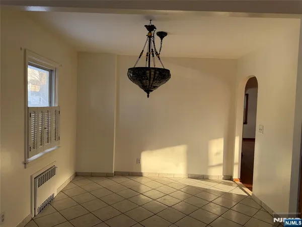 a view of a hallway with windows