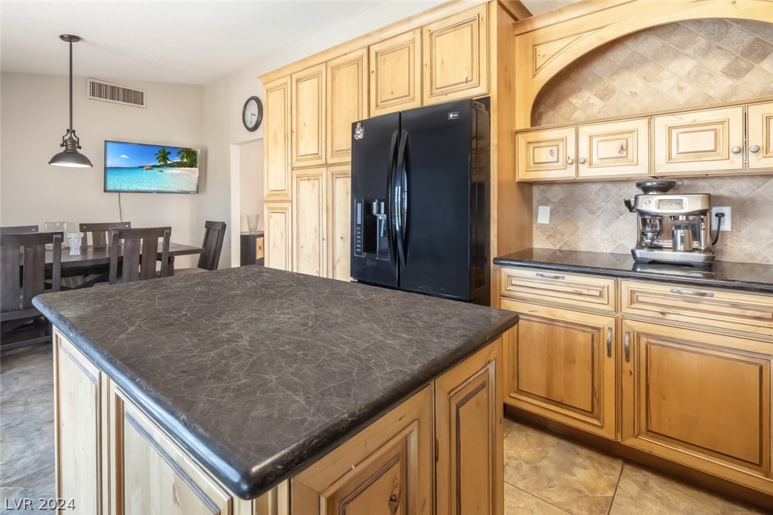 1452 Bronco Road Boulder City, NV 89005 - Photo 11 of 37 Center island is on wheels and can be moved.