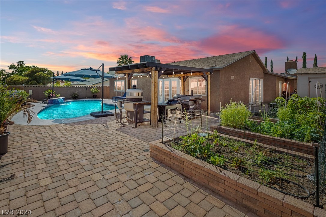 1452 Bronco Road Boulder City, NV 89005 - Photo 24 of 37 Vegetable gardens, BBQ pergola, pool and mountain
