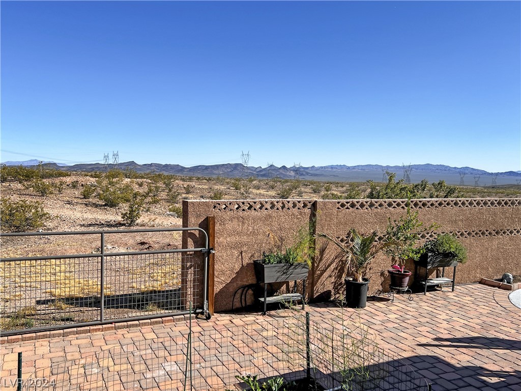1452 Bronco Road Boulder City, NV 89005 - Photo 28 of 37 Amazing mountain views. Rear gate access to vacant