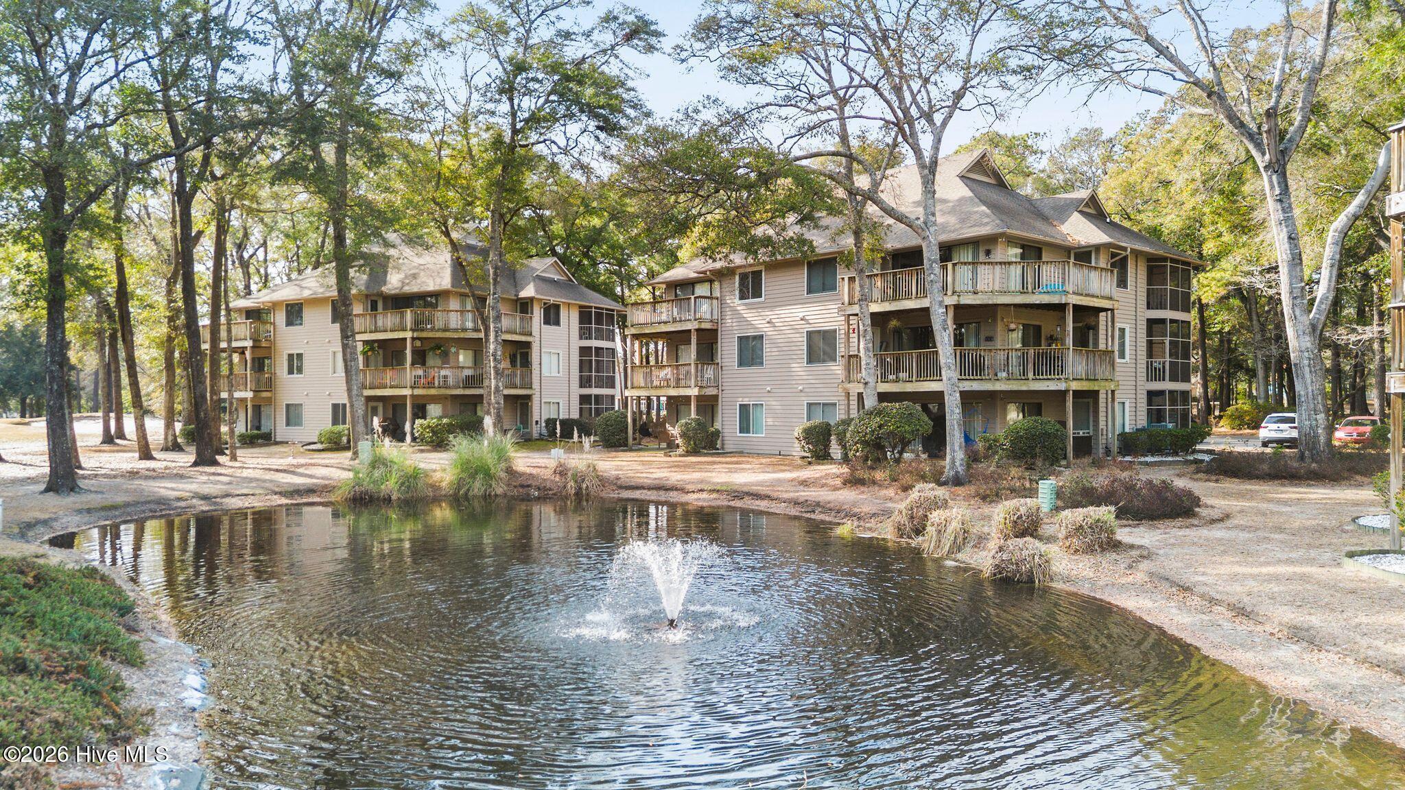 802 Colony Place, Unit F Sunset Beach, NC 28468 - Photo 53 of 60 59_DJI_0390