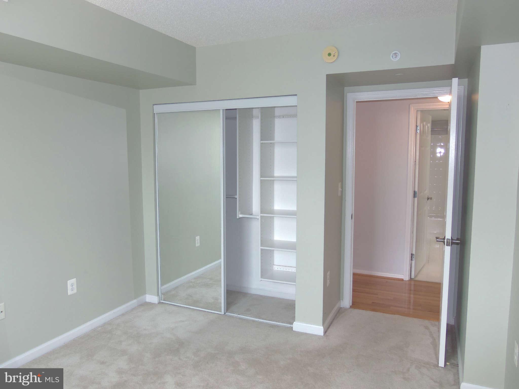 11710 Old Georgetown Road, Unit 1312 North Bethesda, MD 20852 - Photo 17 of 27 second BR w organizer closet sliding mirror door