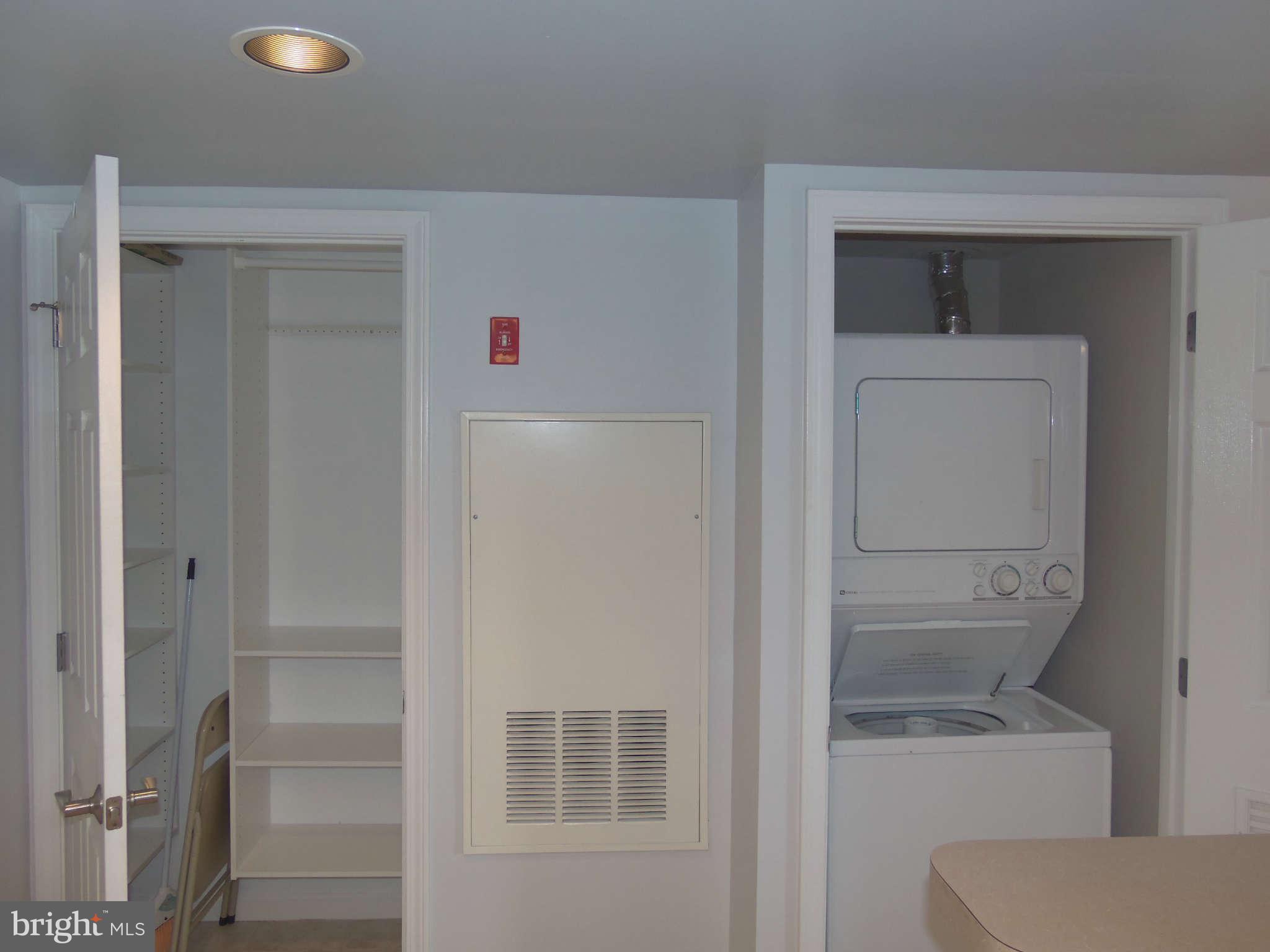 11710 Old Georgetown Road, Unit 1312 North Bethesda, MD 20852 - Photo 18 of 27 Organizer entry closet and washer dryer