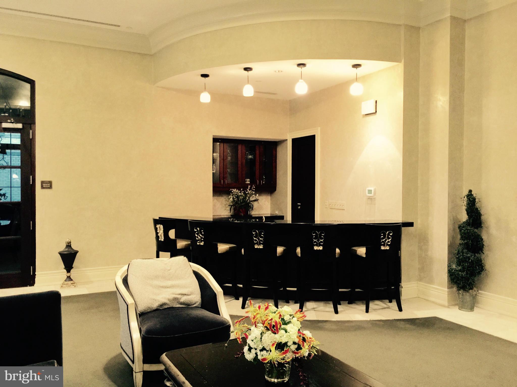 11710 Old Georgetown Road, Unit 1312 North Bethesda, MD 20852 - Photo 23 of 27 bar area in the club room