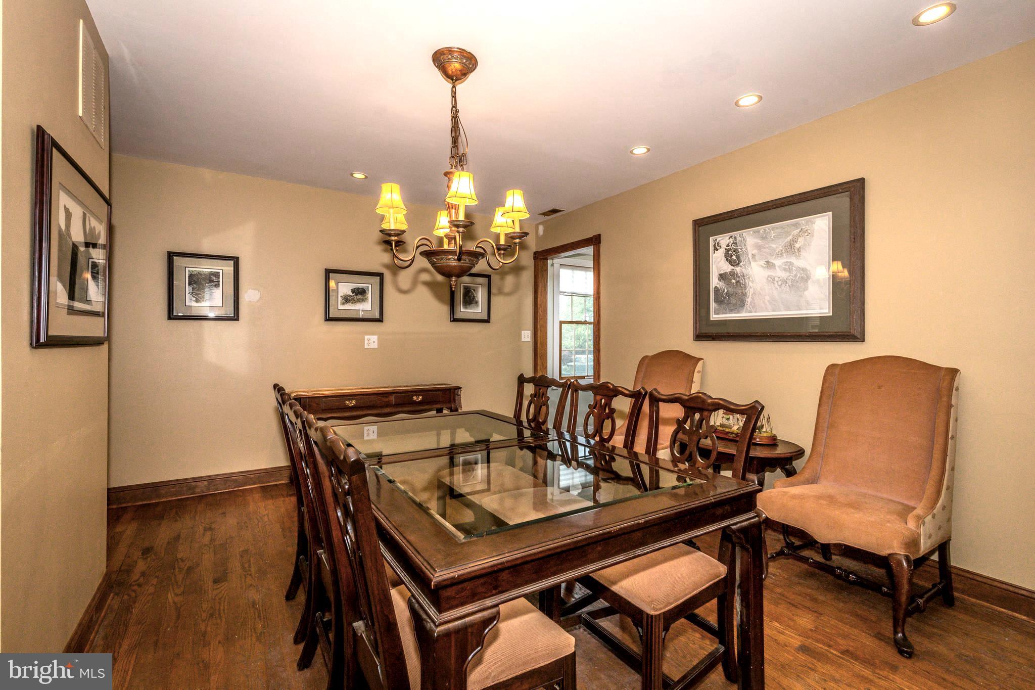 1313 Mayo Road Edgewater, MD 21037 - Photo 18 of 42 Chandeliered Formal Dining Room