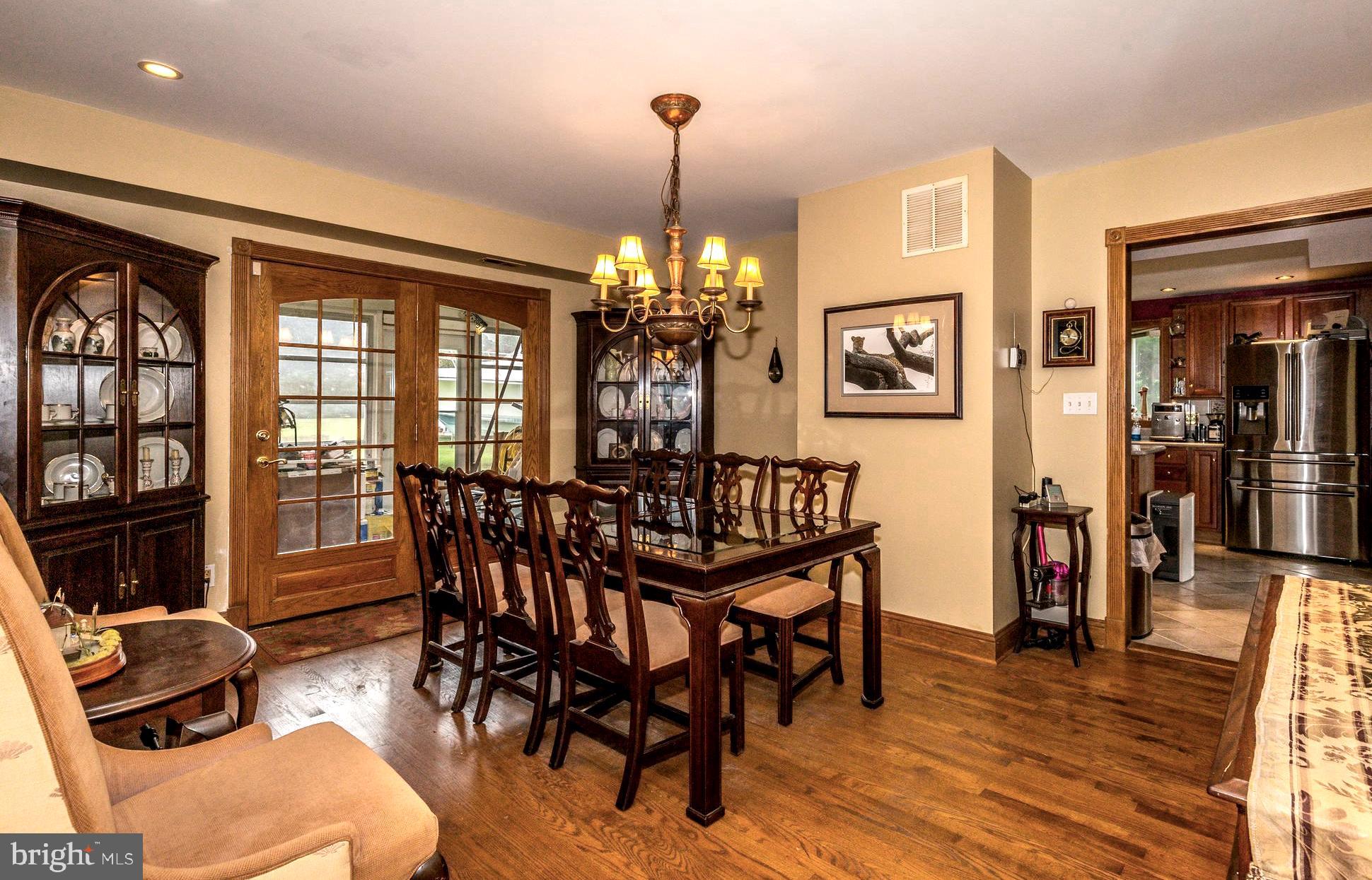 1313 Mayo Road Edgewater, MD 21037 - Photo 19 of 42 Seamless Flow Between Dining Room & Kitchen