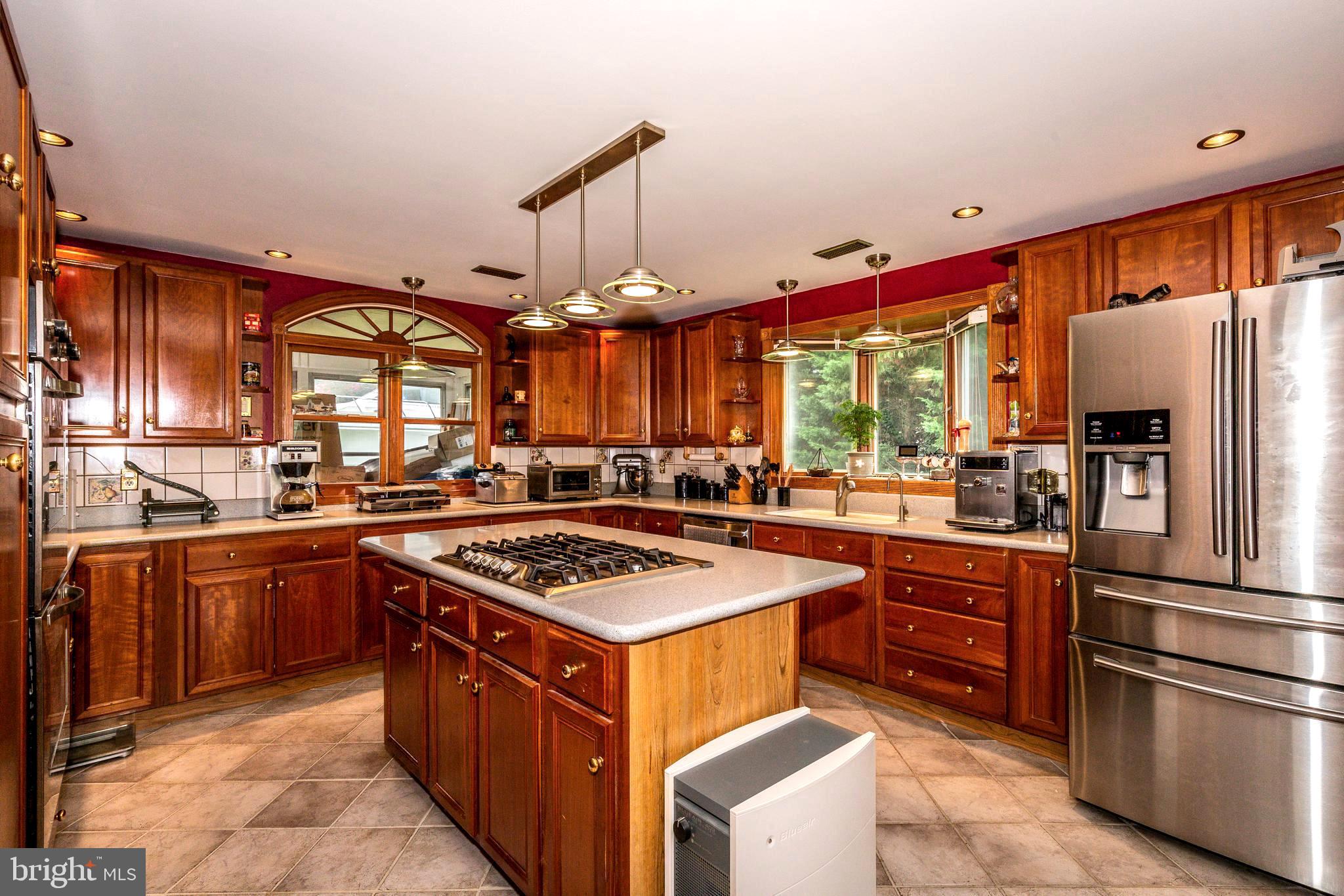 1313 Mayo Road Edgewater, MD 21037 - Photo 20 of 42 Updated Country Kitchen with Cooktop Island