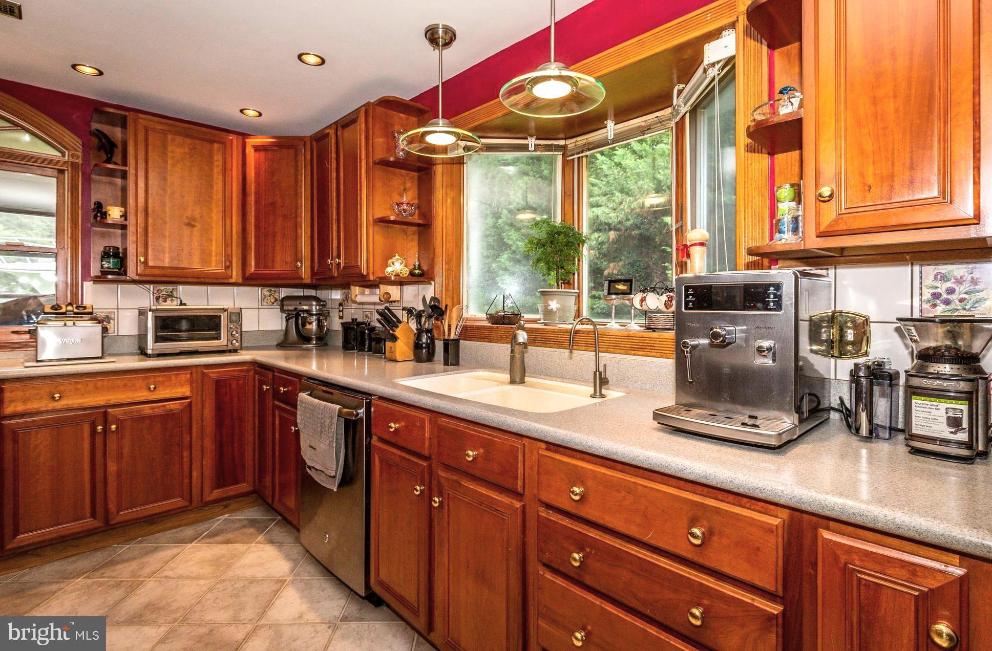 1313 Mayo Road Edgewater, MD 21037 - Photo 24 of 42 Tile Backsplash . Faux Granite Counters