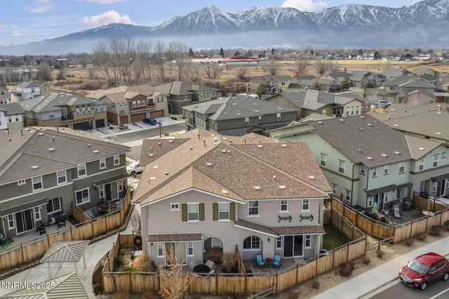 a kitchen with counter top space a sink cabinets and stainless steel appliances