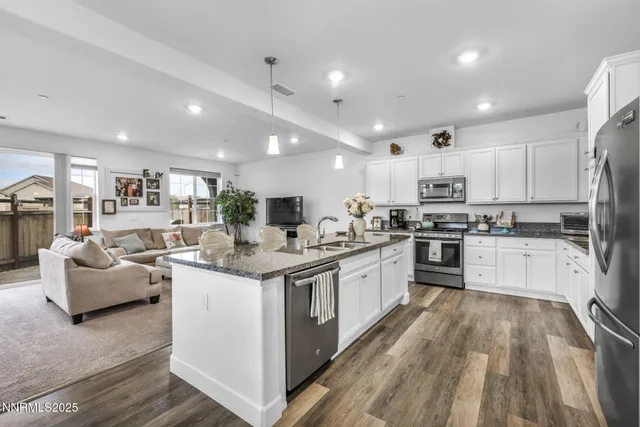 a view of a workspace with furniture