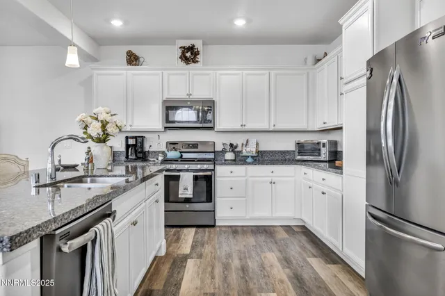 a bedroom with a bed and dresser