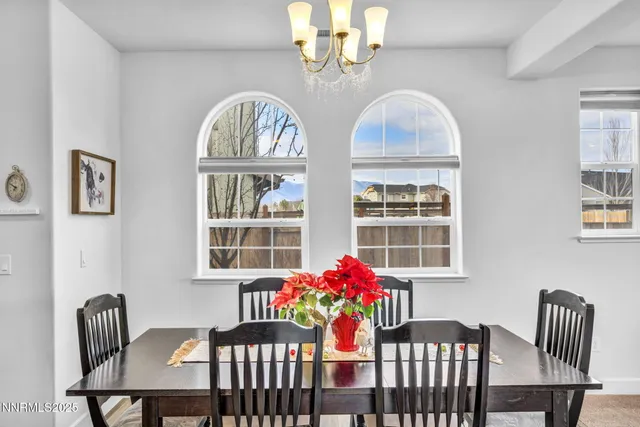 a view of walk in closet with clothes