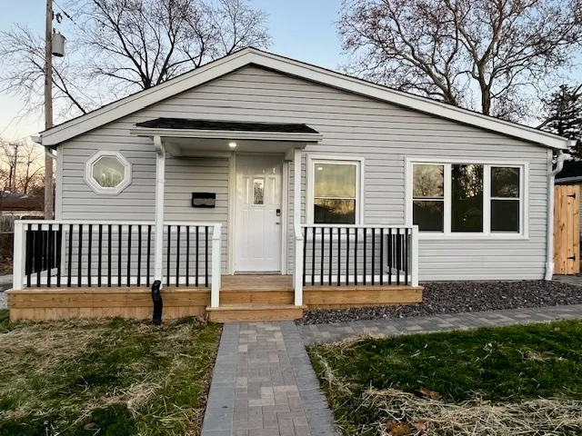 a front view of a house with a porch