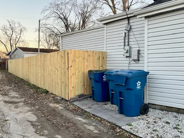 a view of a back yard of the house