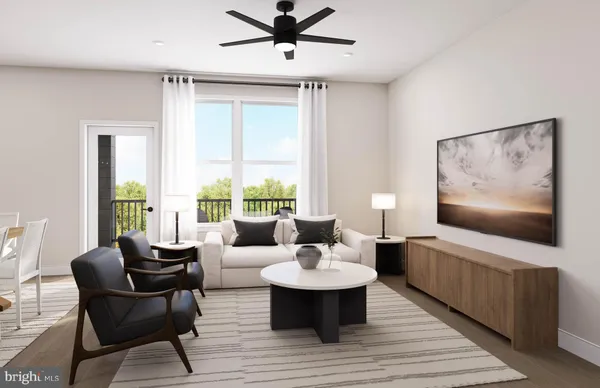a kitchen with stainless steel appliances and white cabinets