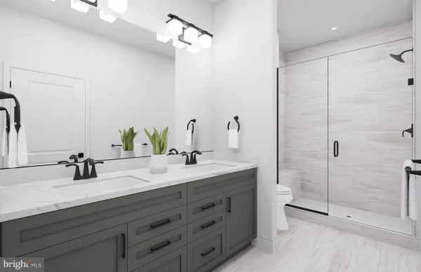 a spacious bedroom with a bed and a chandelier